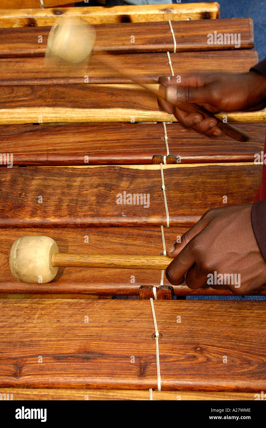 Black African hands playing a xylophone Stock Photo Alamy
