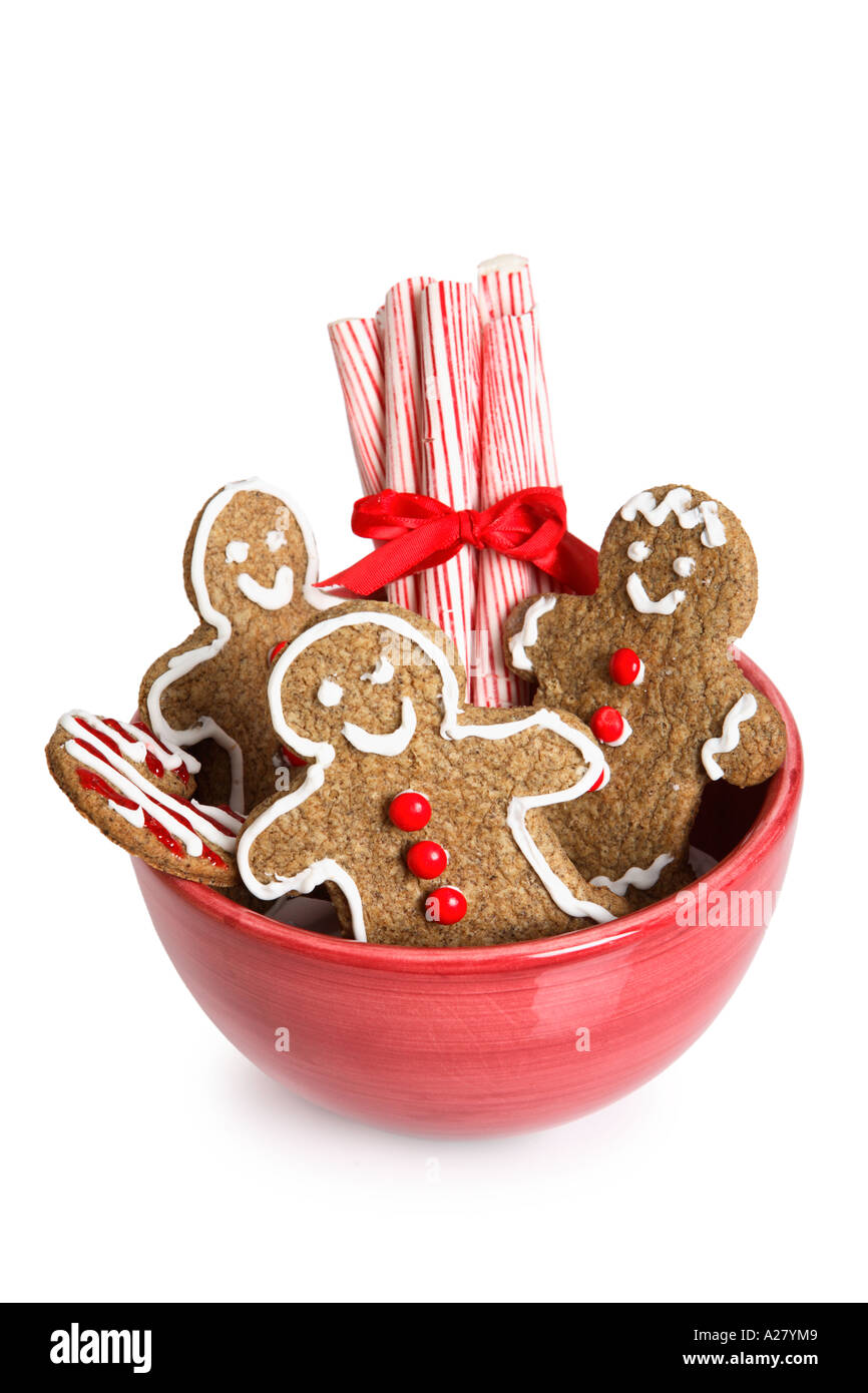 Bowl of Holiday treats; Gingerbread cookies and peppermint sticks Stock Photo