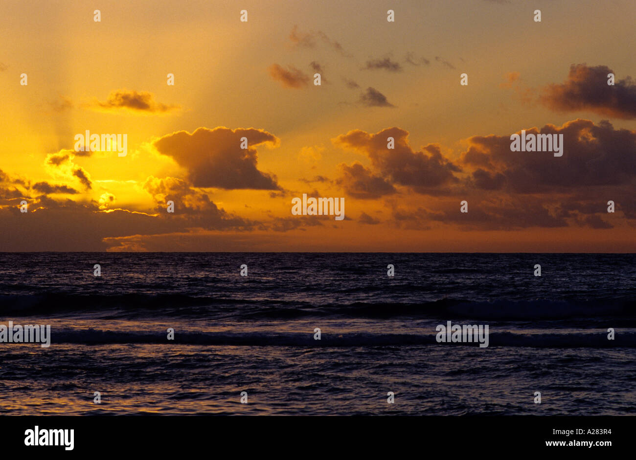 A Pacific Ocean sunrise in Hawaii Stock Photo - Alamy