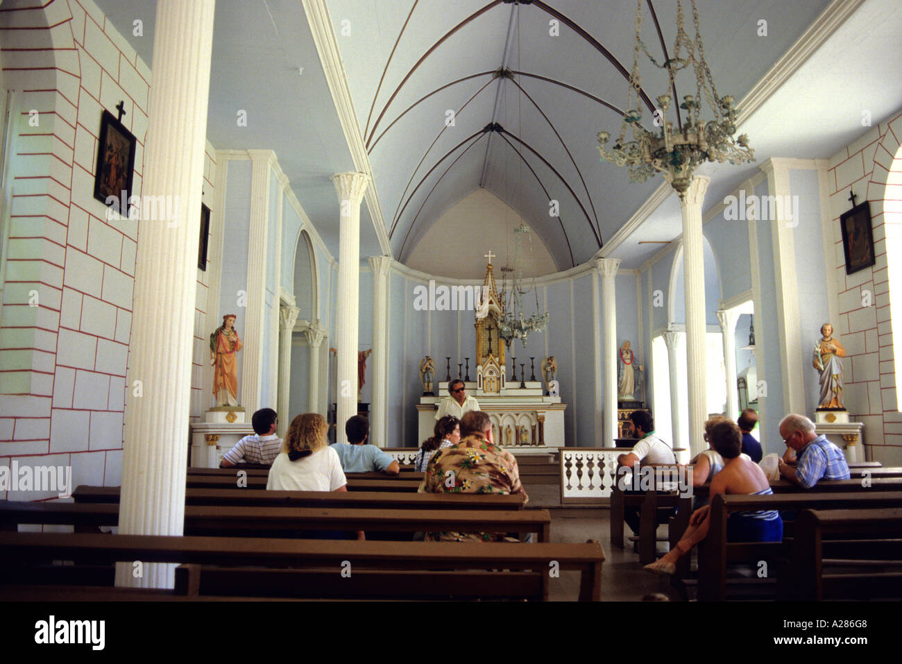 The interior of St. Philomena Catholic Church on the island of Molokai, Hawaii. Stock Photo