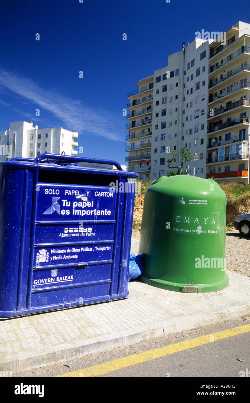 Recycle bins in Spain. Paper on left and glass on right Stock Photo Alamy
