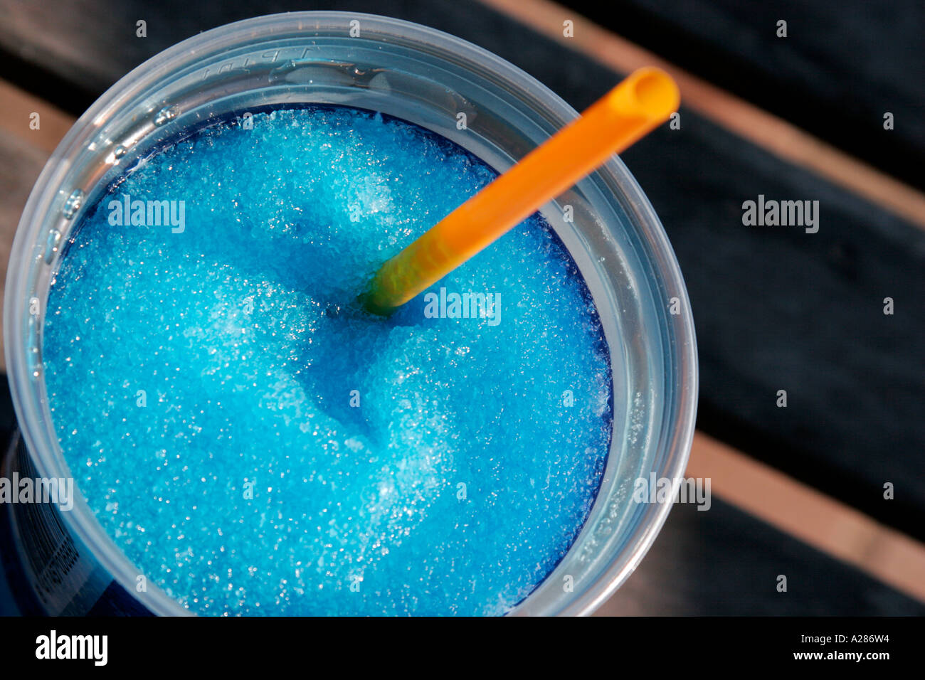 Blue slush frozen iced drink with straw Stock Photo