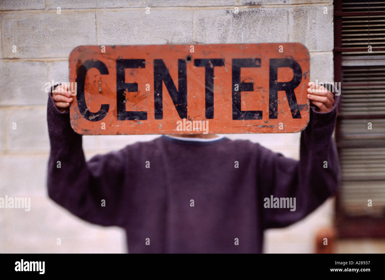 person holding street sign Stock Photo