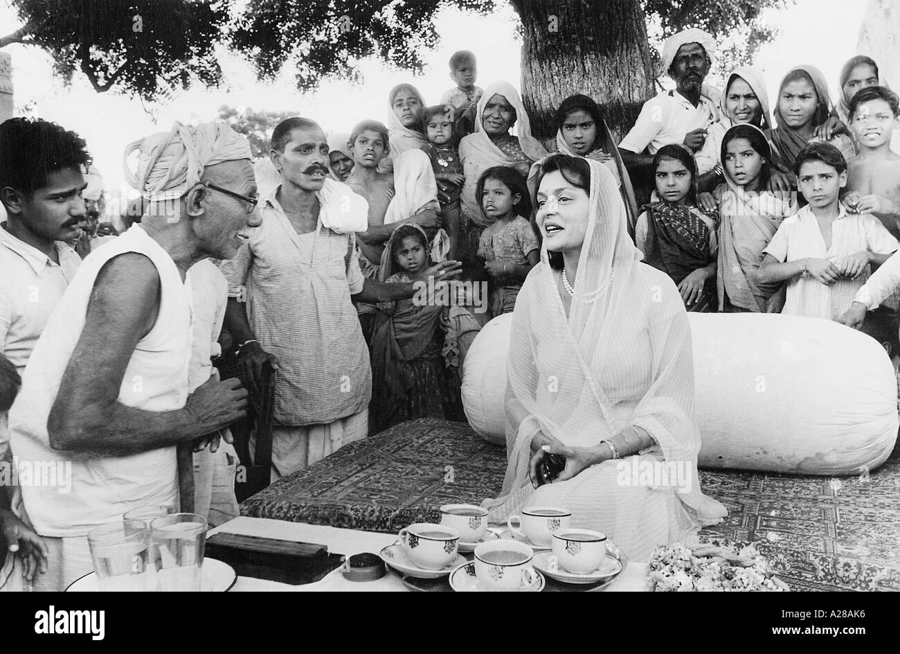 Maharani Gayatri Devi of Jaipur with villagers in Rajasthan during her campaign for election to the Indian Parliament 1962 India Asia Stock Photo