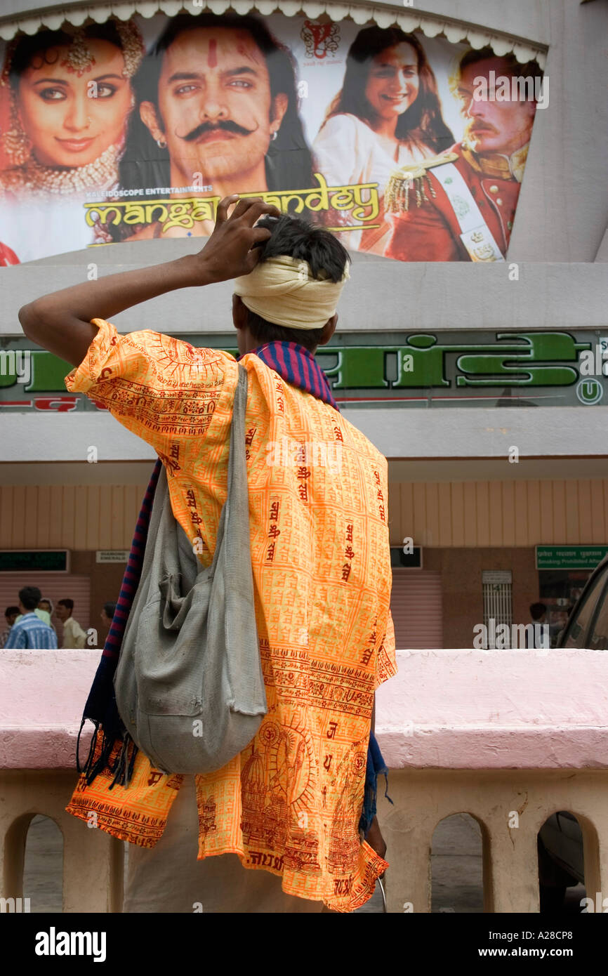 RSC76722 Indian sadhu priest in saffron clothes with shoulder bag