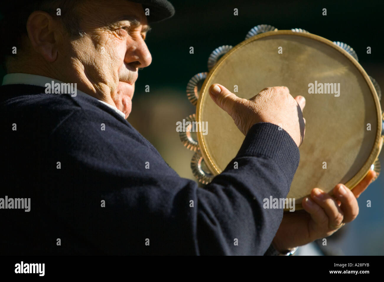 Playing tambourine hires stock photography and images Alamy