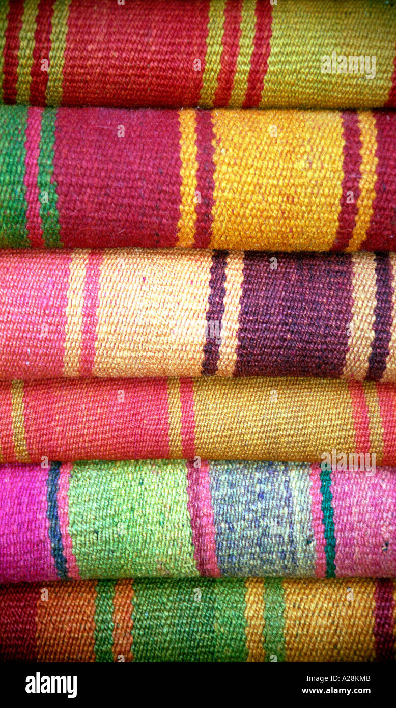 Stacked stripey material, Cuzco shop, Peru Stock Photo