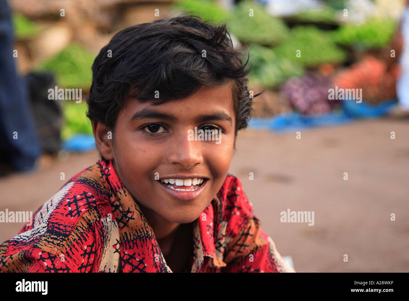 Young Boy On Streets Of Mapusa City Goa India Stock Photo