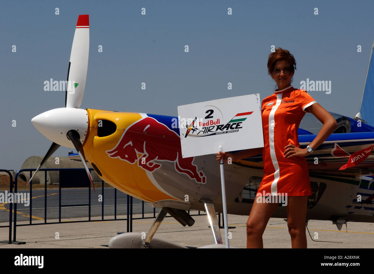 Red Bull Air Race pilots with their planes Turkish promo girls on Red ...