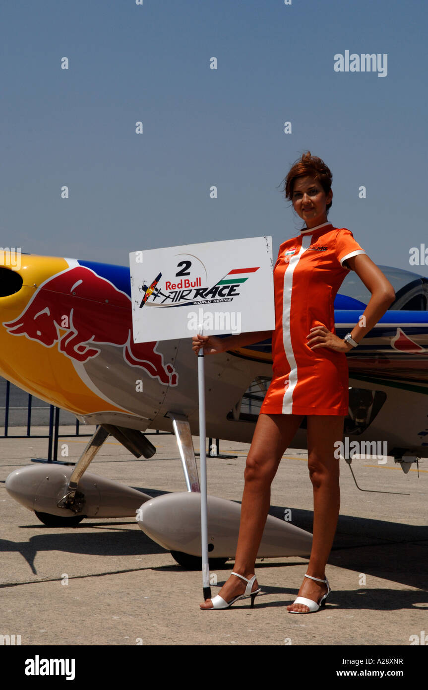 Red Bull Air Race pilots with their planes Turkish promo girls on Red ...