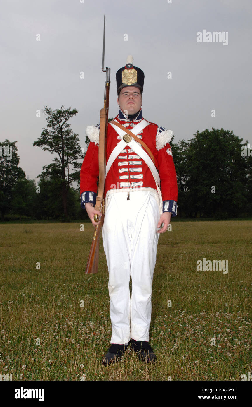 Man in historic English army soldier uniform with Rifle and Bayonet Stock Photo