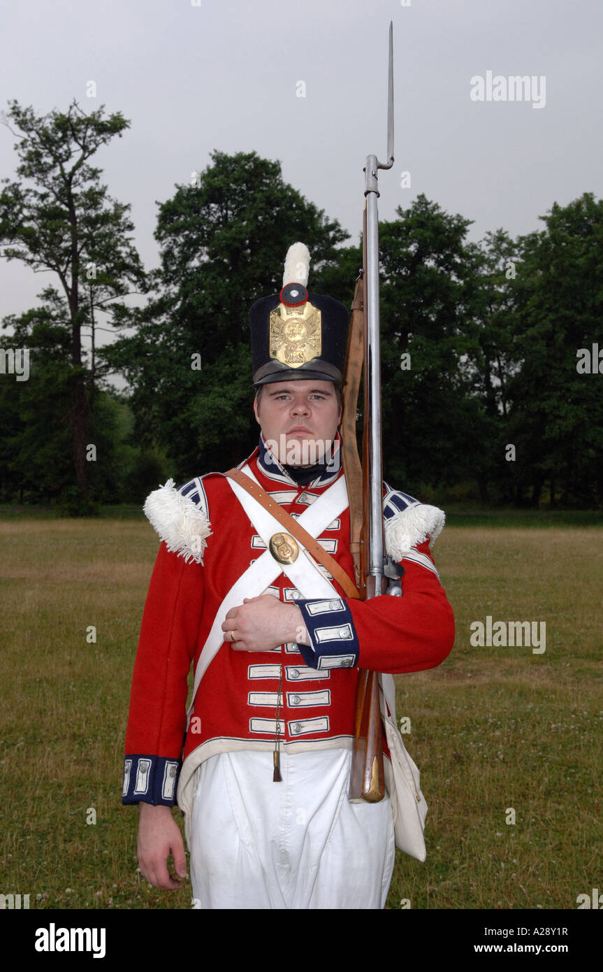 Man in historic English army soldier uniform with Rifle and Bayonet Stock Photo