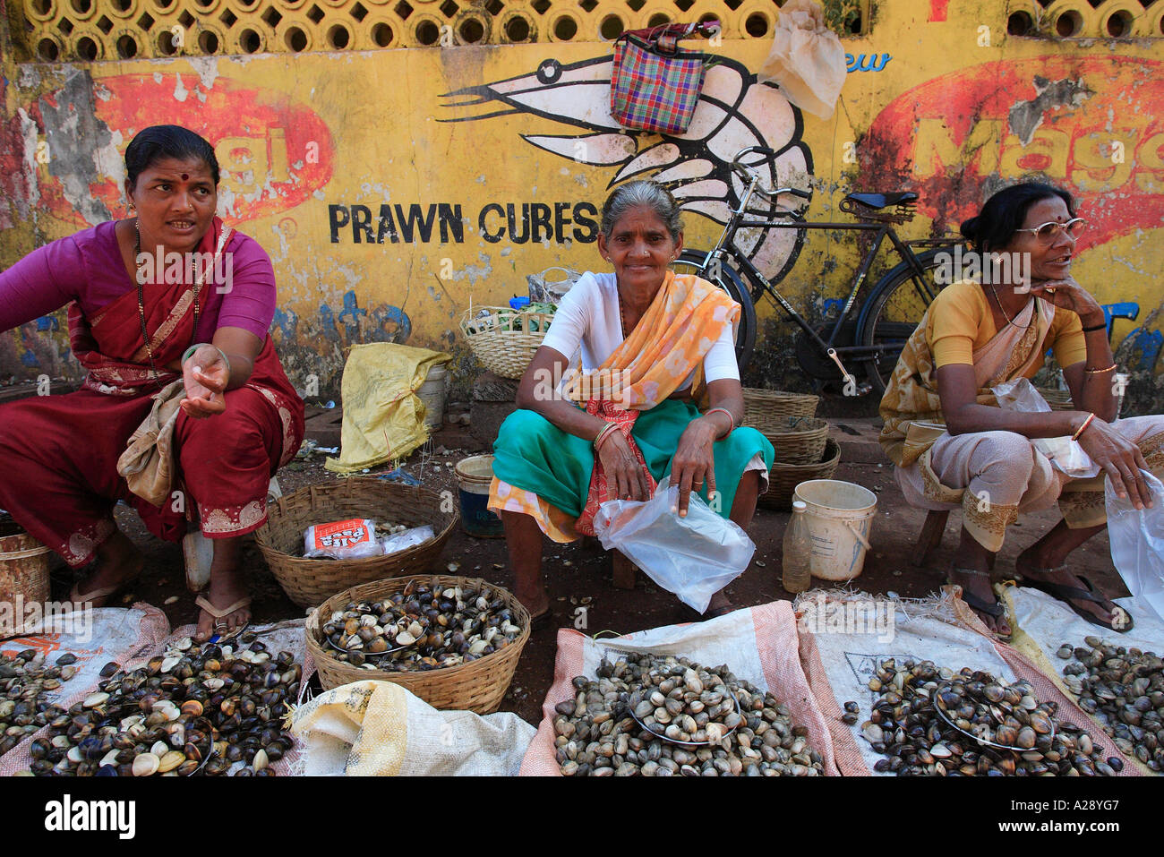 Market trader selling fresh shell fish Mapusa city Goa India Stock ...