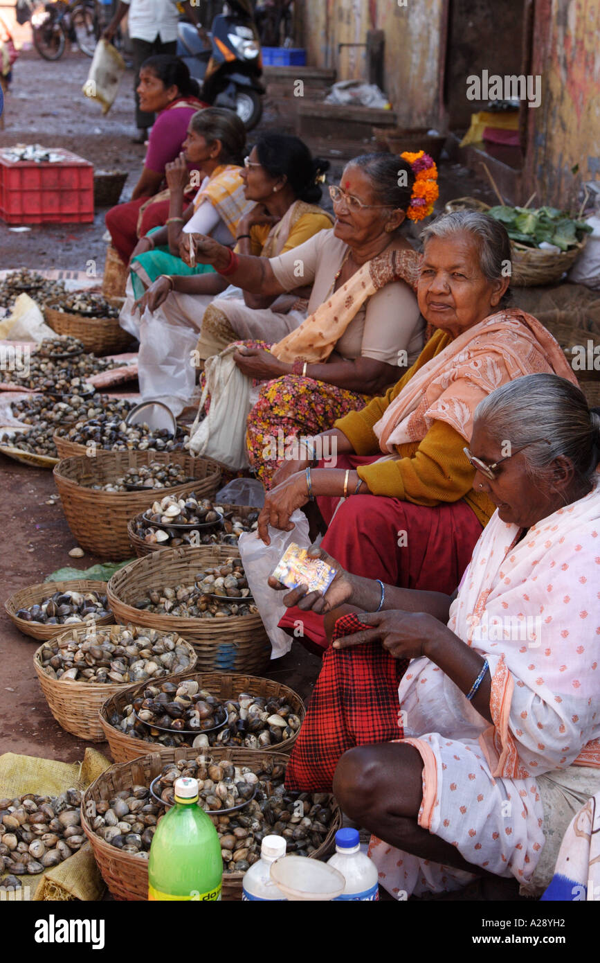 Market trader selling fresh shell fish Mapusa city Goa India Stock ...