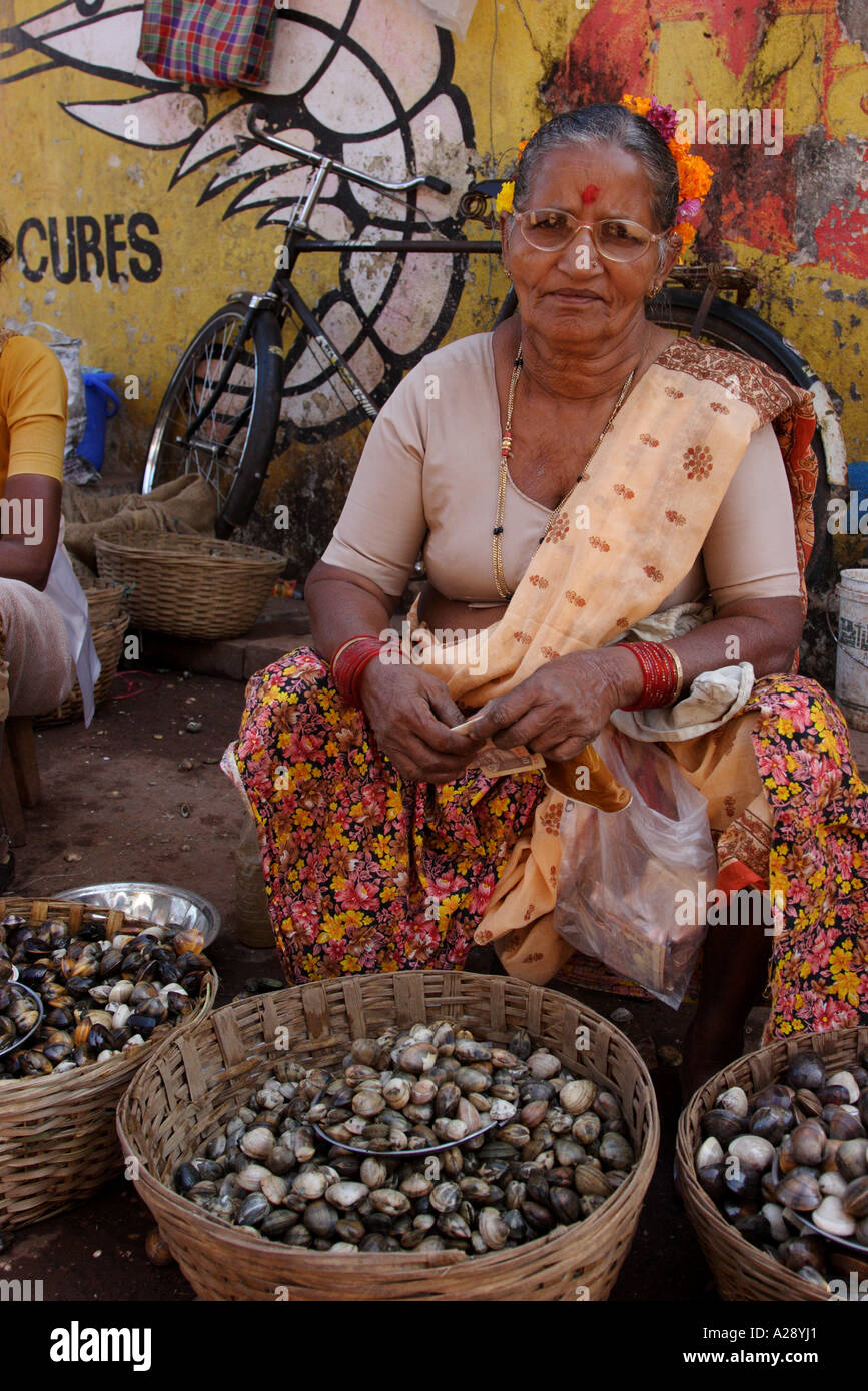 Market trader selling fresh shell fish Mapusa city Goa India Stock ...