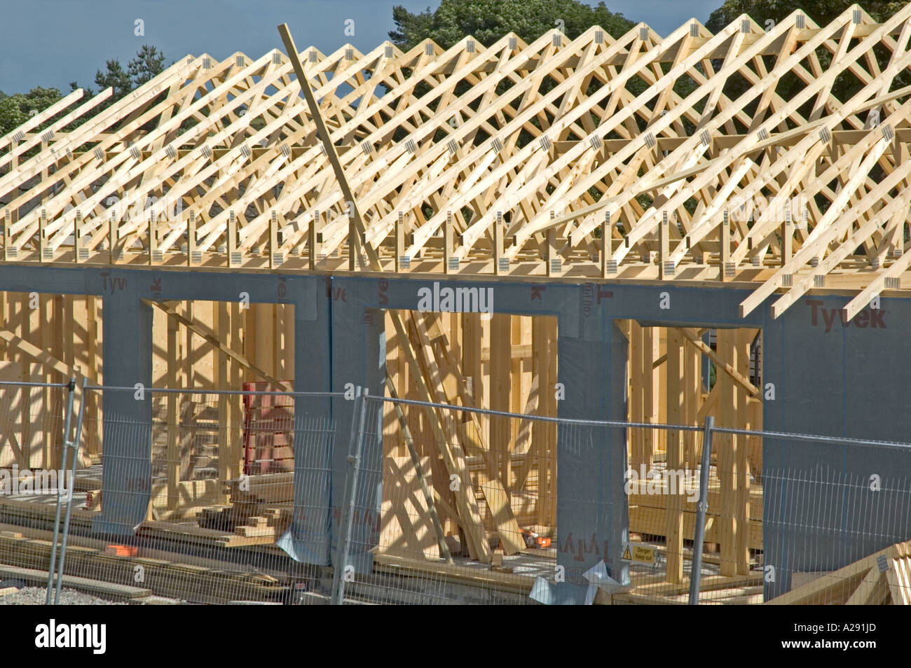 a timber framed home under construction Stock Photo