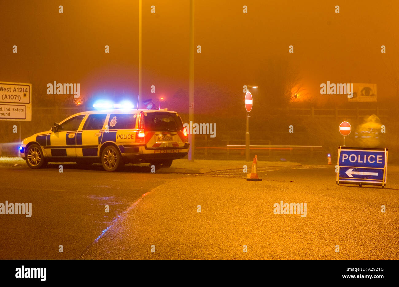Police car with blue flashing lights at an accident in Ipswich Stock Photo