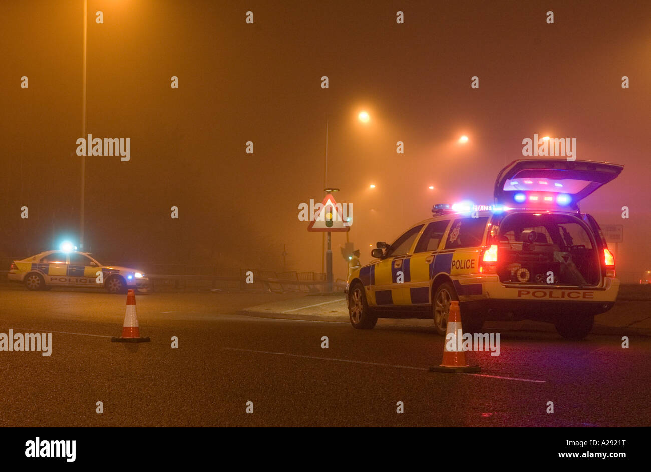 Night time incident with police cars in attendance Stock Photo