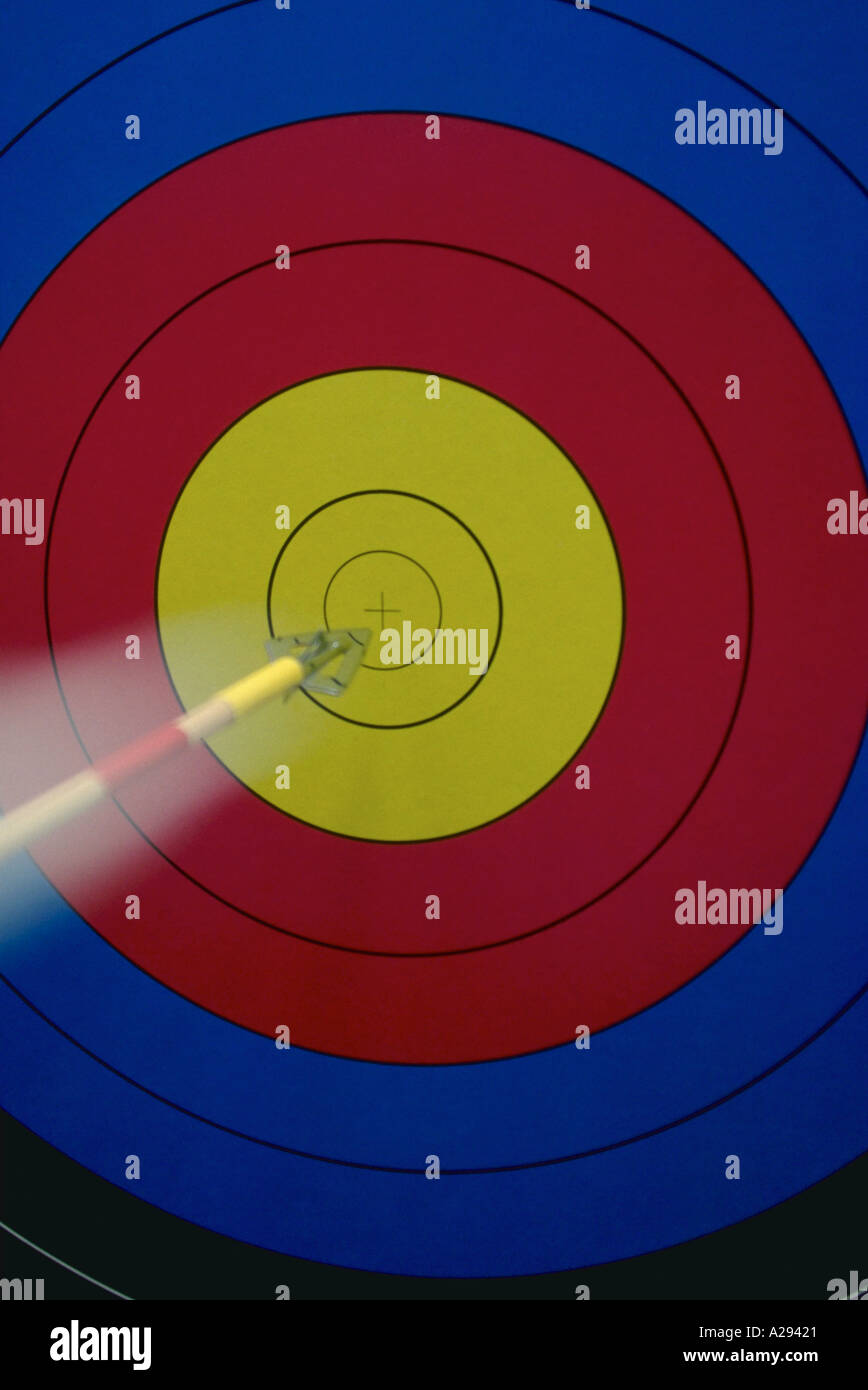 Arrow hitting bullseye on target Stock Photo Alamy