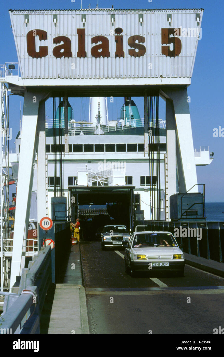Cars boarding ferry at Calais Stock Photo Alamy