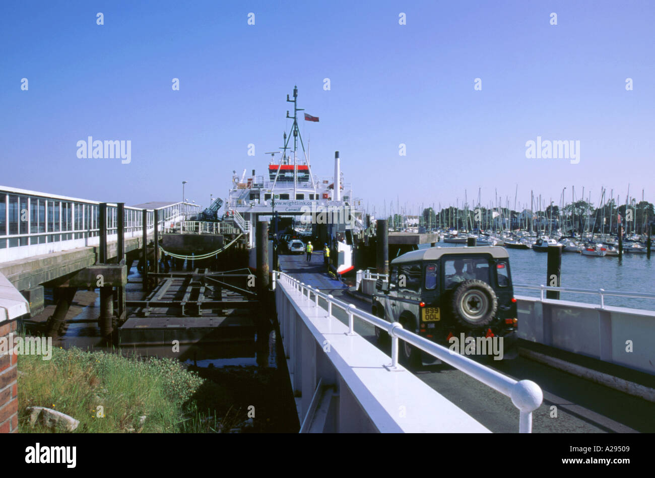 Cars boarding Lymington ferry bound for Isle of Wight Stock Photo Alamy
