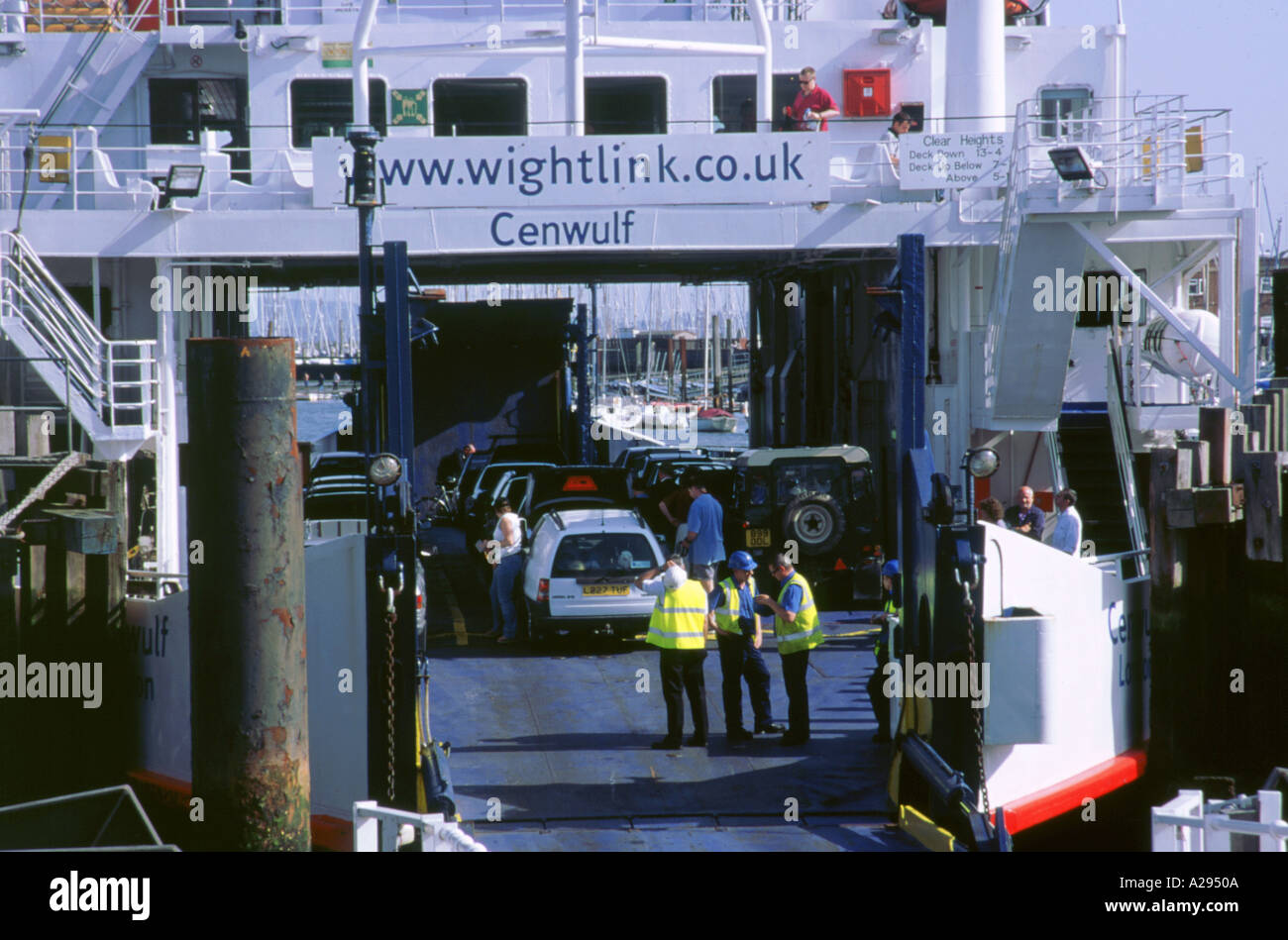 Cars boarding Lymington ferry bound for Isle of Wight Stock Photo Alamy