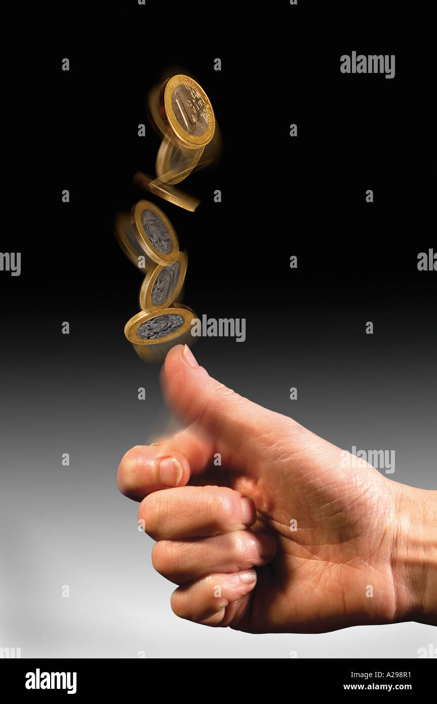 hand tossing Euro coin Stock Photo Alamy