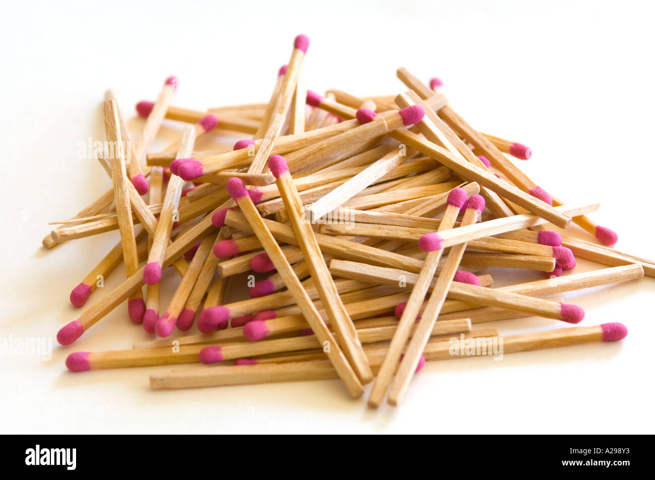 dangerous  pile of kitchen matches with red tips Stock Photo