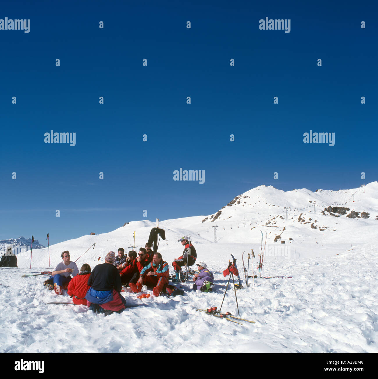 Picnicking on the slopes in the Mont Fort ski area, Verbier, Valois, Bernese Alps, Switzerland Stock Photo