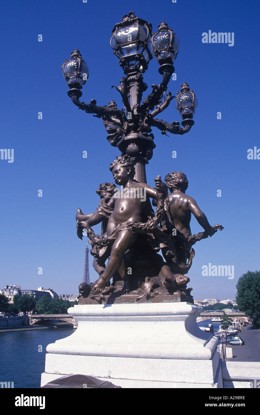 Statues of cherubs on Alexandre III Bridge over Seine Paris France ...