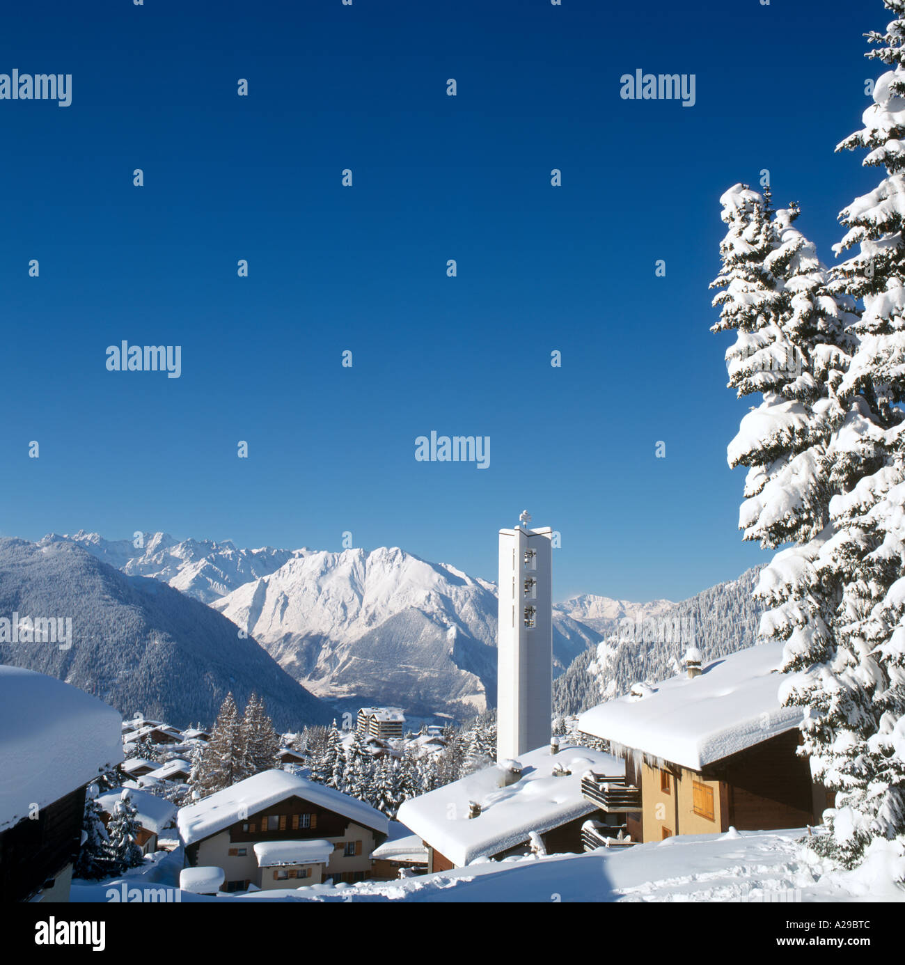 Church and View over  the resort, Verbier, Valois, Swiss Alps, Switzerland Stock Photo