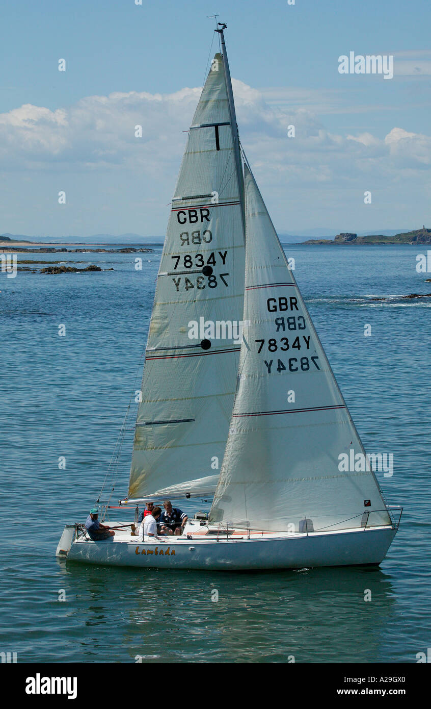 Yacht with white sail, sailing in Forth estuary, North Sea, East Coast, Scotland; visit Stock Photo