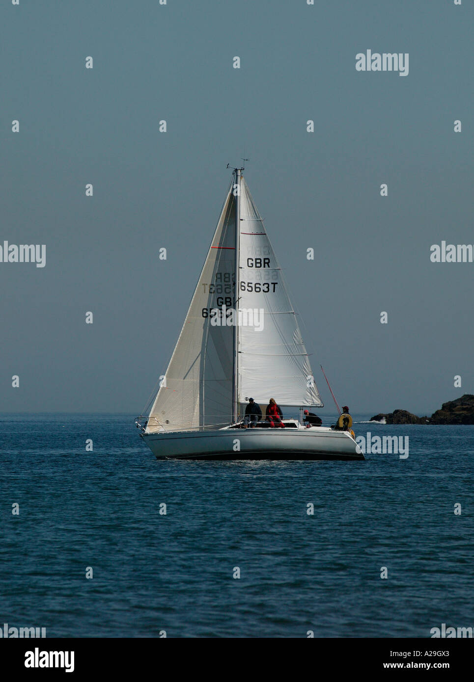 Yacht with white sail, sailing in Forth estuary, North Sea, East Coast, Scotland Stock Photo