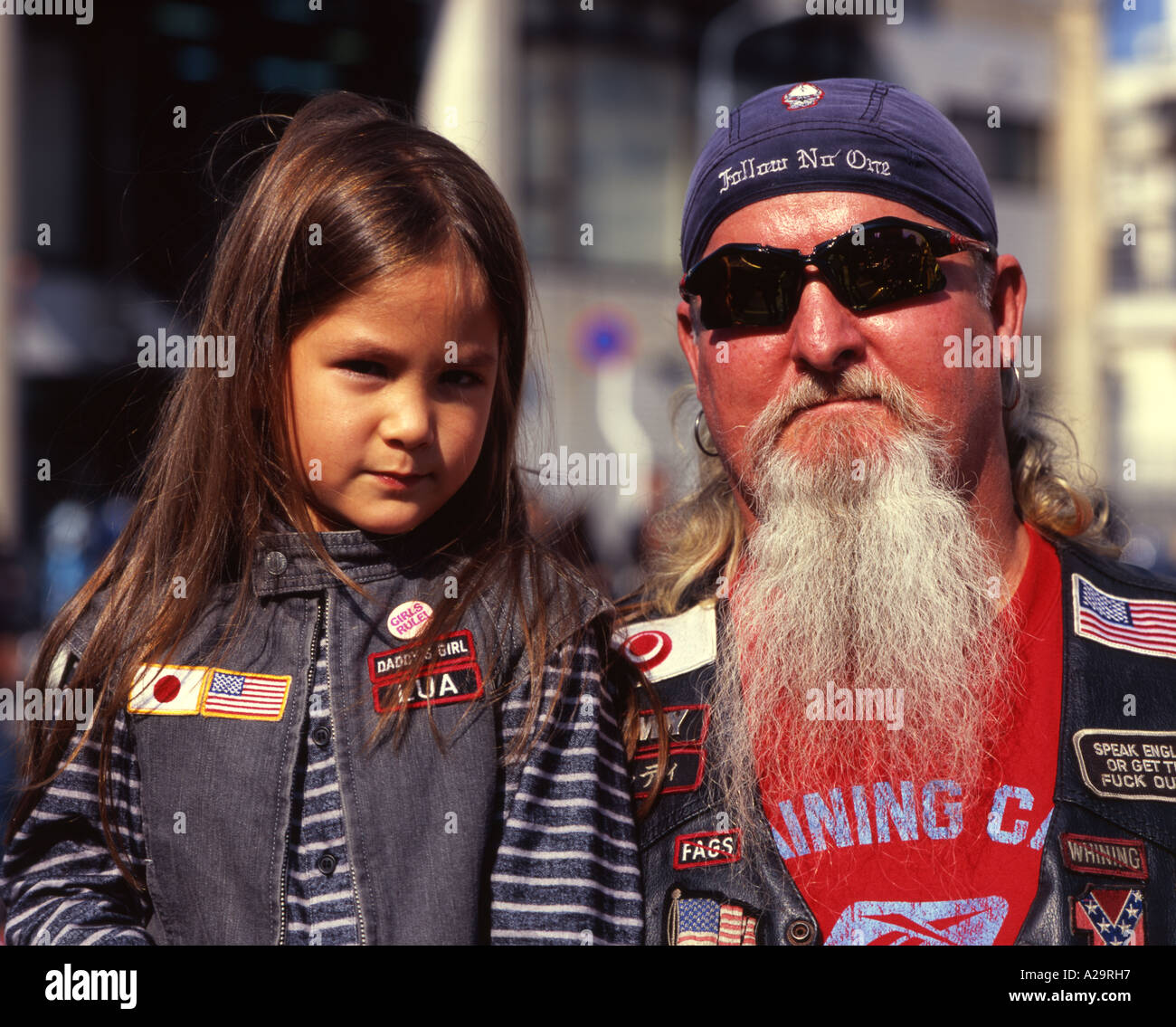 American Harley Davidson Rider and daughter  at Okinawa City Gate 2 Festival Stock Photo