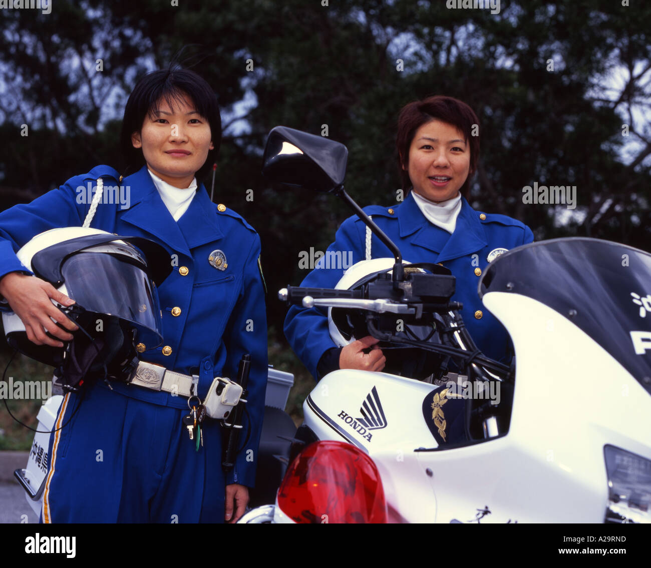 Female Police Motorcycle Officers and their Honda 750cc bike, Okianwa, Japan Stock Photo