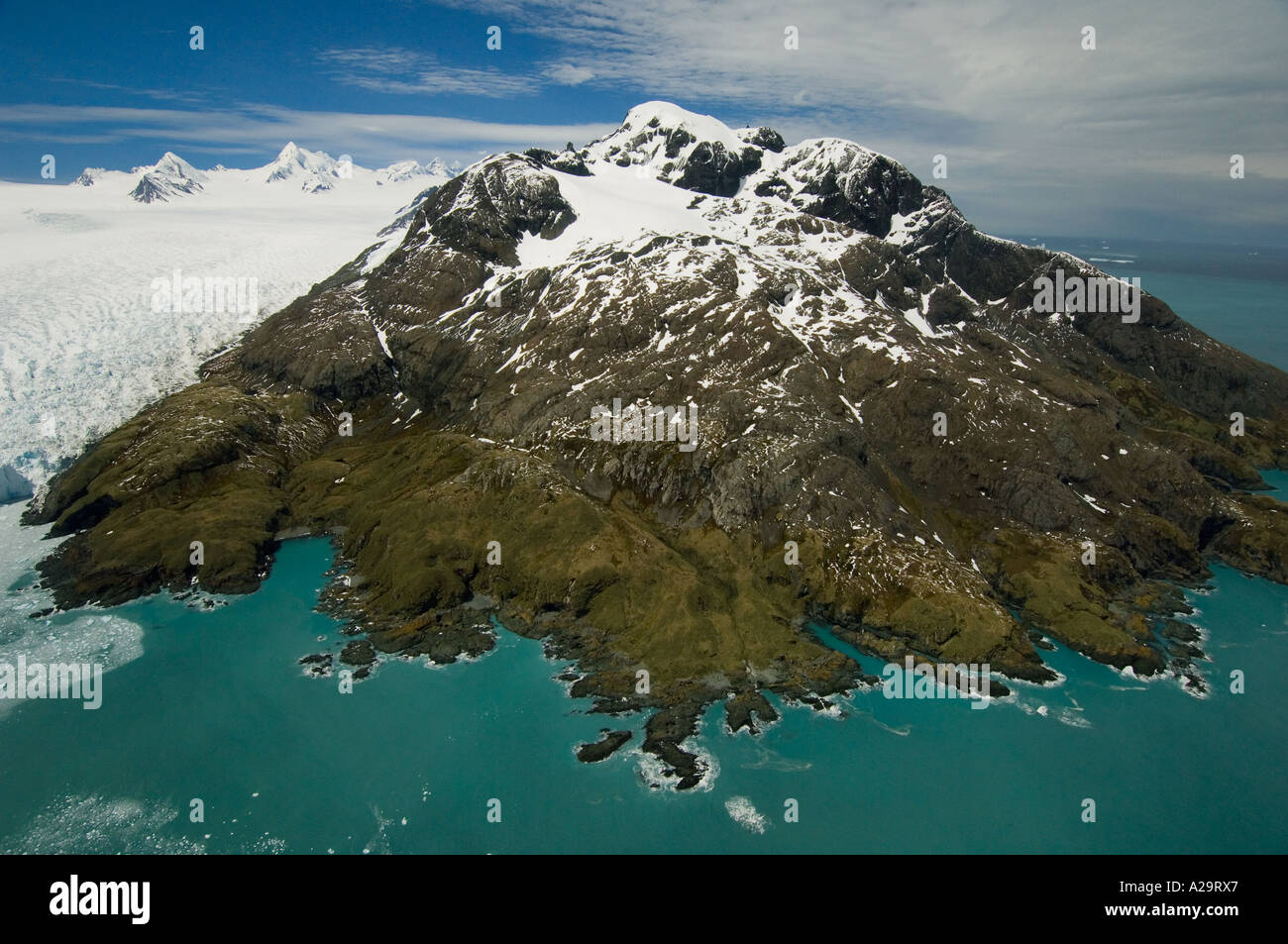 South Georgia Island, Antarctica, Aerial of Leon Head, Undine South Harbour, Brogger Glacier at left. Stock Photo