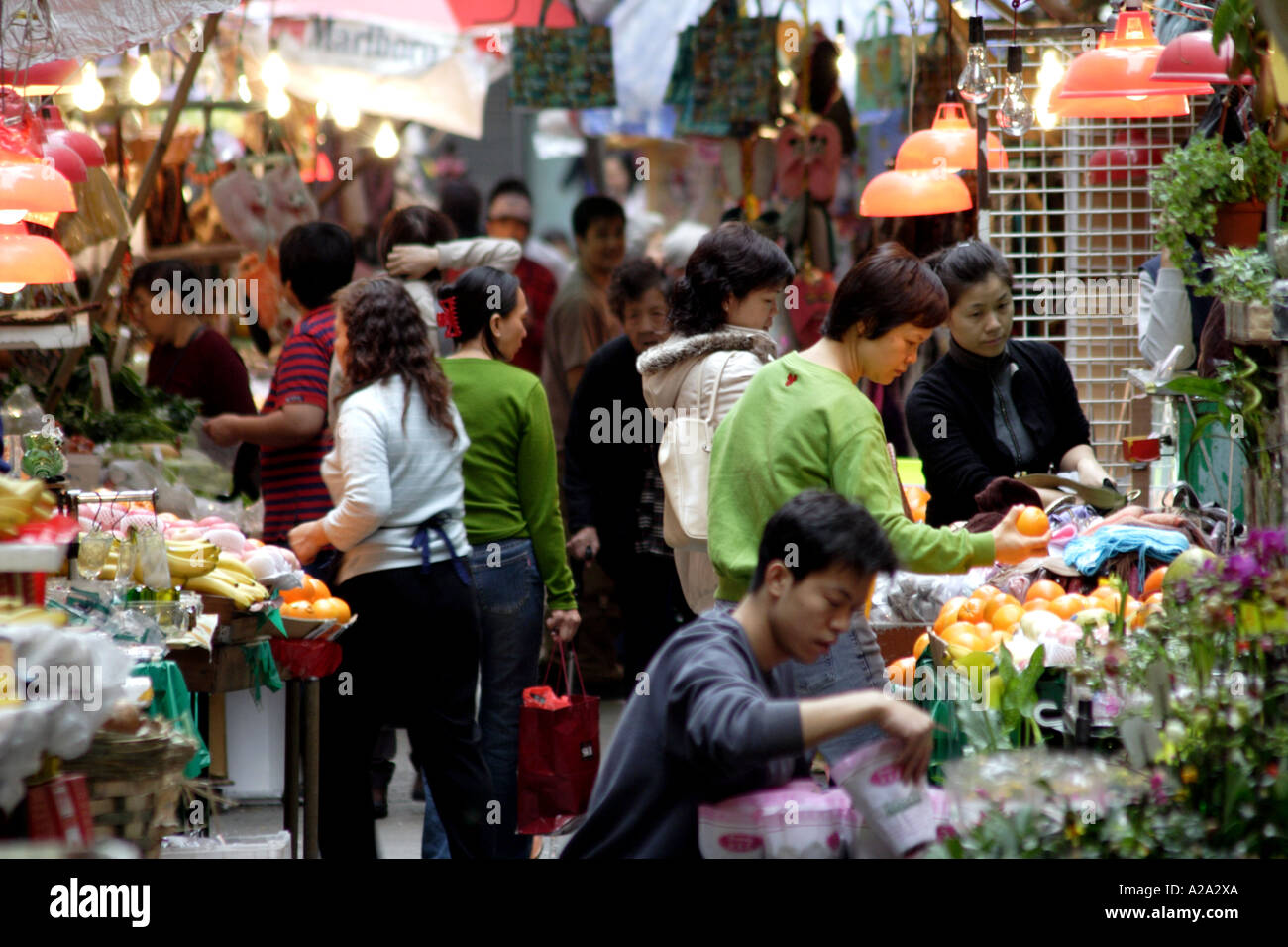 Local people purchase much of their food needs at neighborhood wet markets, Wanchai, Hong Kong Stock Photo
