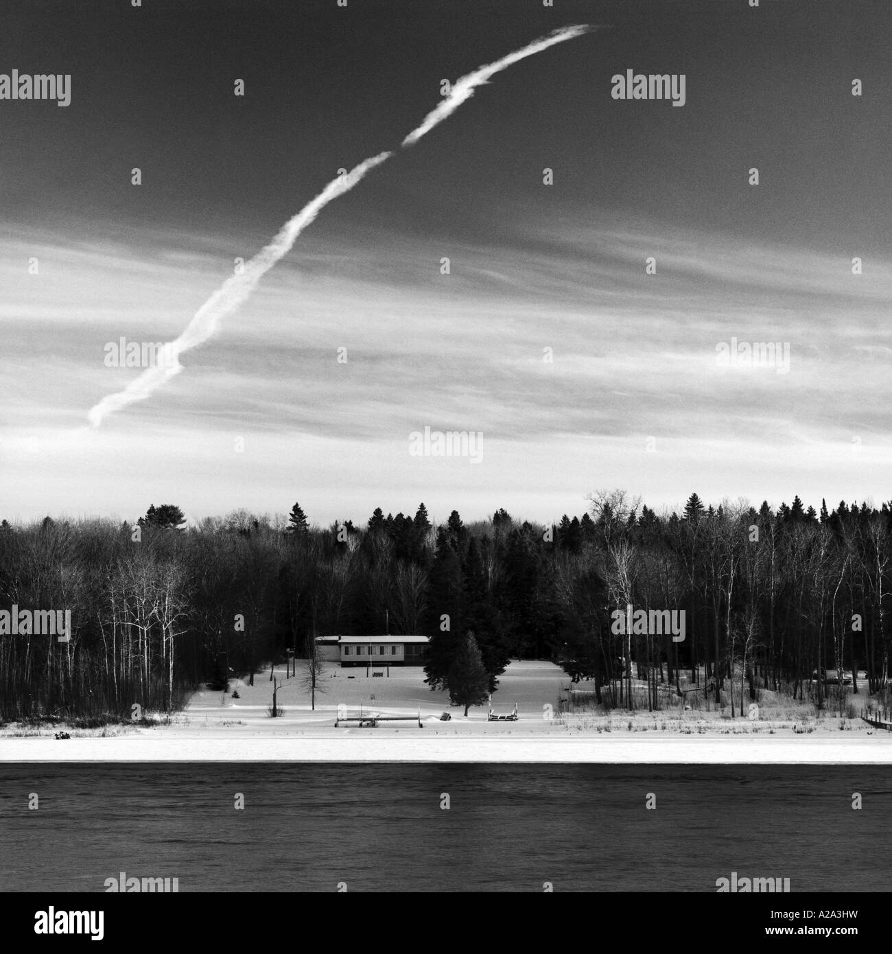 White airplane trace Black and White Stock Photos & Images - Alamy