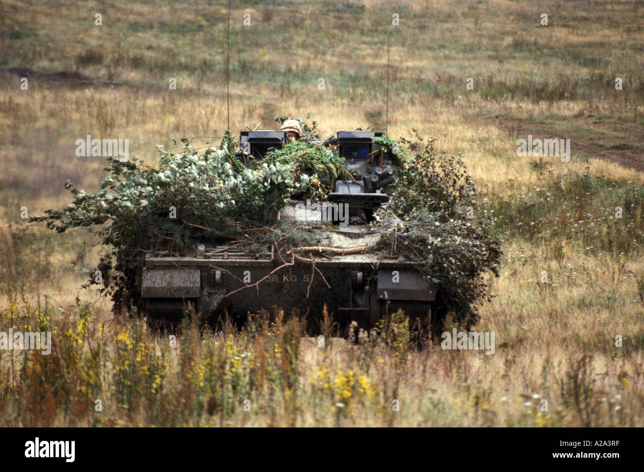 British army Warrior armoured combat vehicle camouflaged with Stock ...