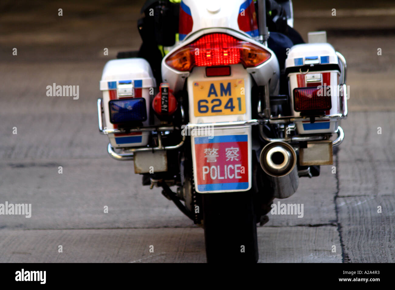 Motorcycle Policeman on the streets of Hong Kong Stock Photo Alamy