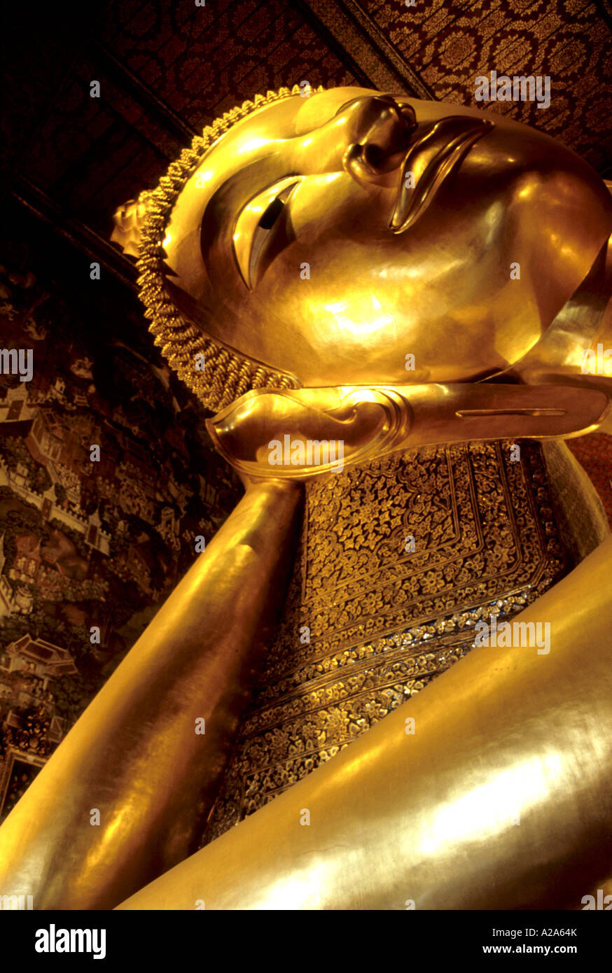 Enormous golden Reclining Buddha statue within Wat Pho Bangkok Thailand ...