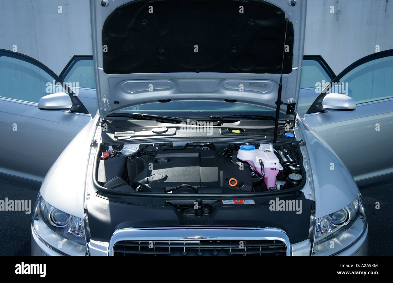 Car with open engine hood and doors Stock Photo Alamy