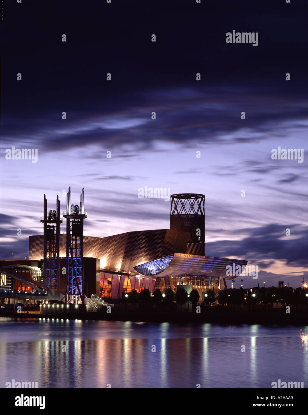 Lowry Arts Centre, Salford Quays, Manchester. Exterior at dusk  with reflection of light in the water. Stock Photo