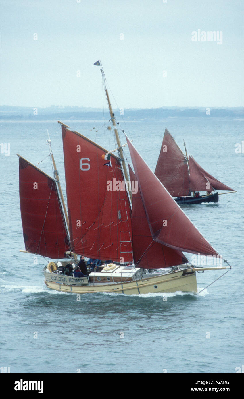 The 1981 Cornish Pilot Trader Golden Nomad sailing off Howth Dublin Ireland Stock Photo