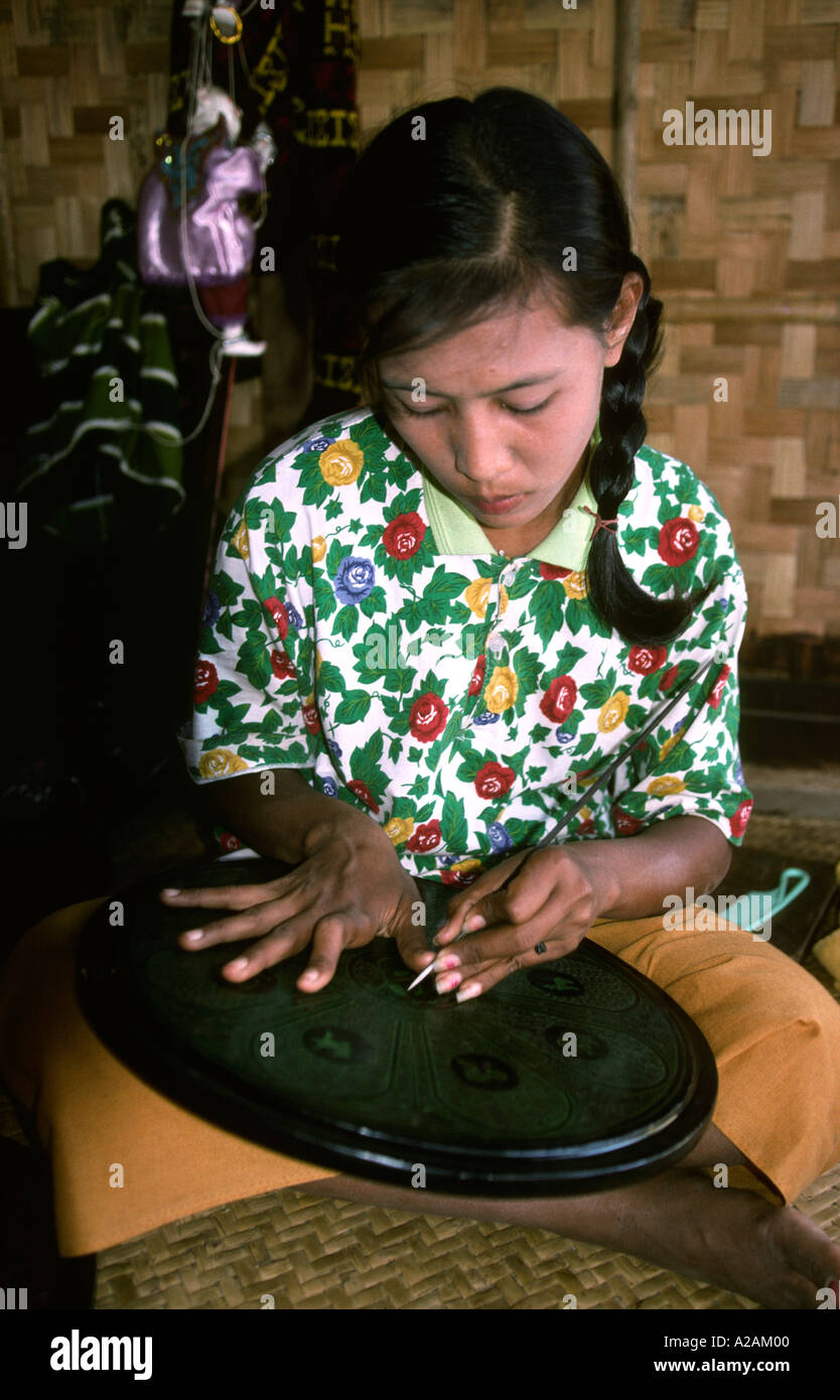 Myanmar Burma pagan crafts woman engraving lacquerware panel Stock Photo