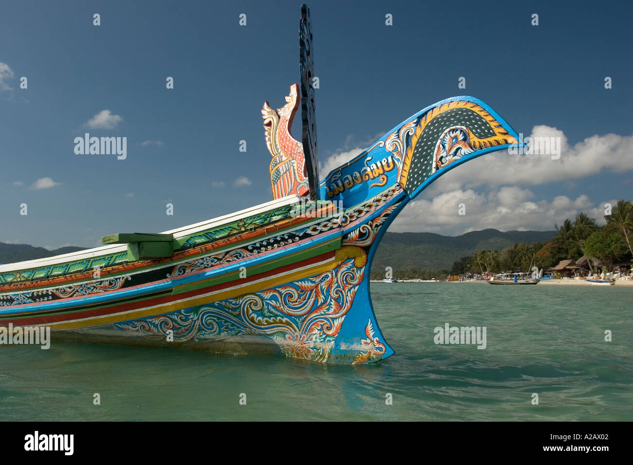 Thailand Ko Samui East Coast Chaweng beach prow of decoratively painted long tail boat Stock Photo