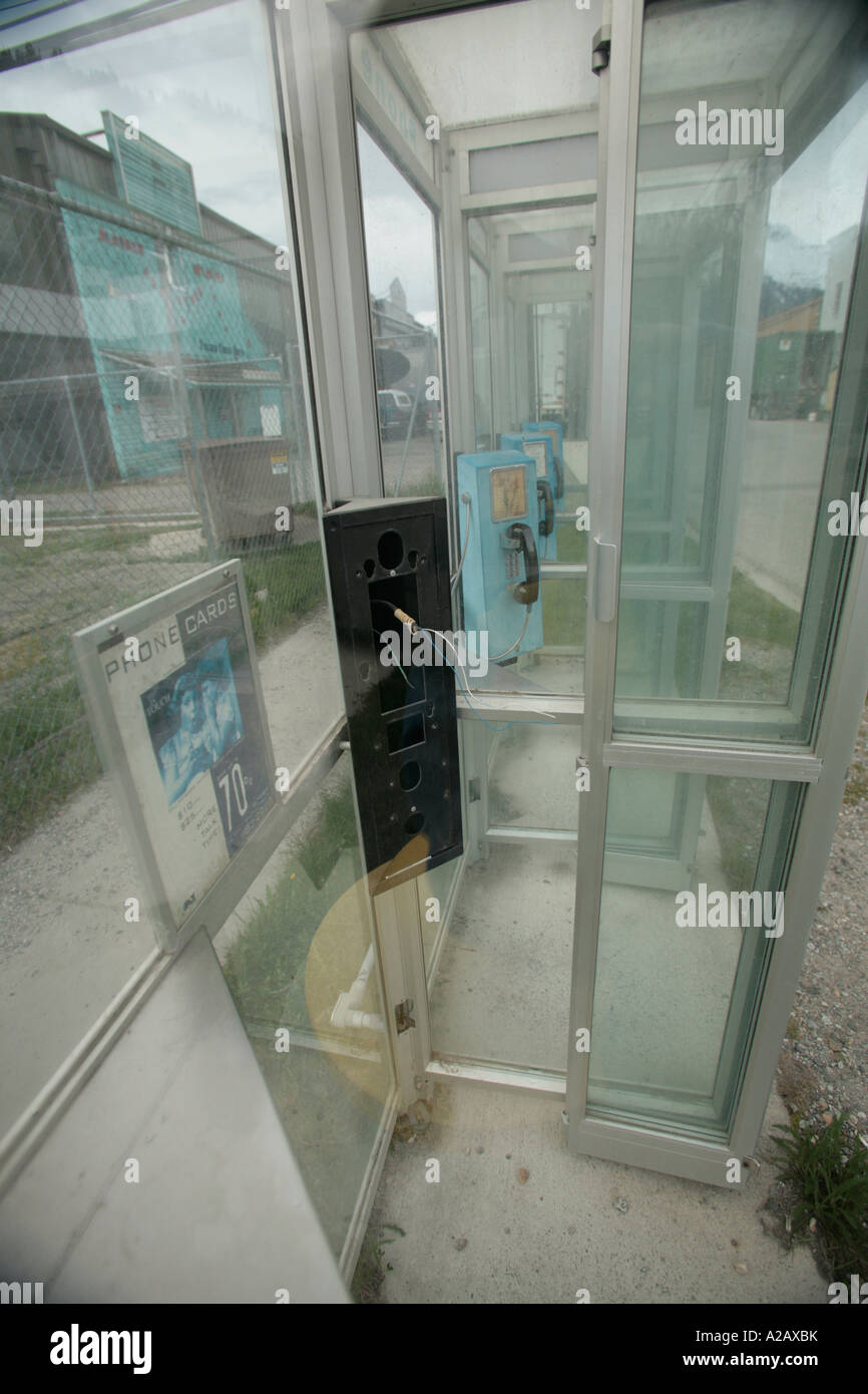 disused vandalised telphone kiosk Stock Photo