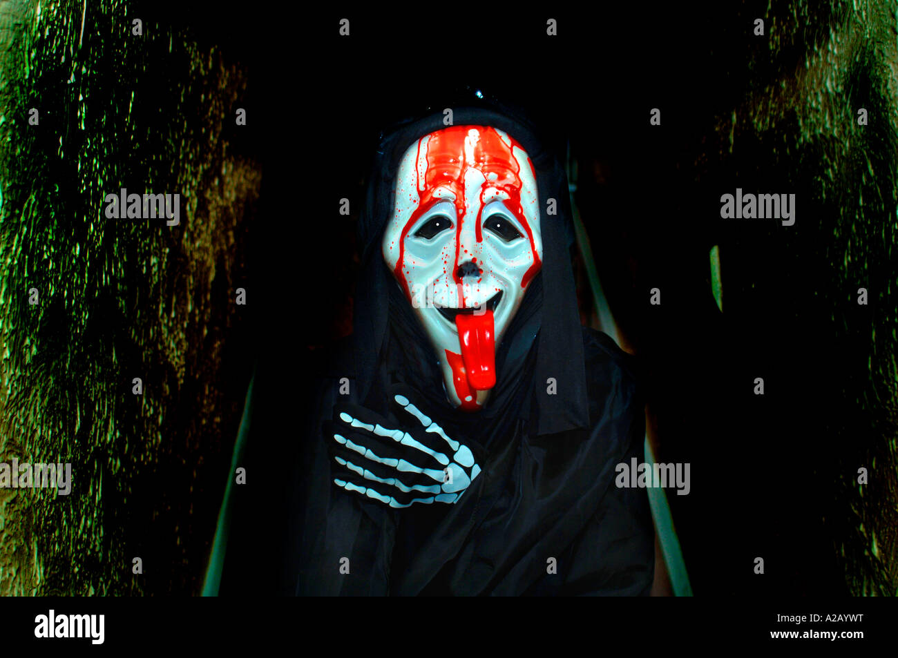 Boy Dressed Up For Halloween ,Wearing A Scary Movie Mask & Gloves.Also