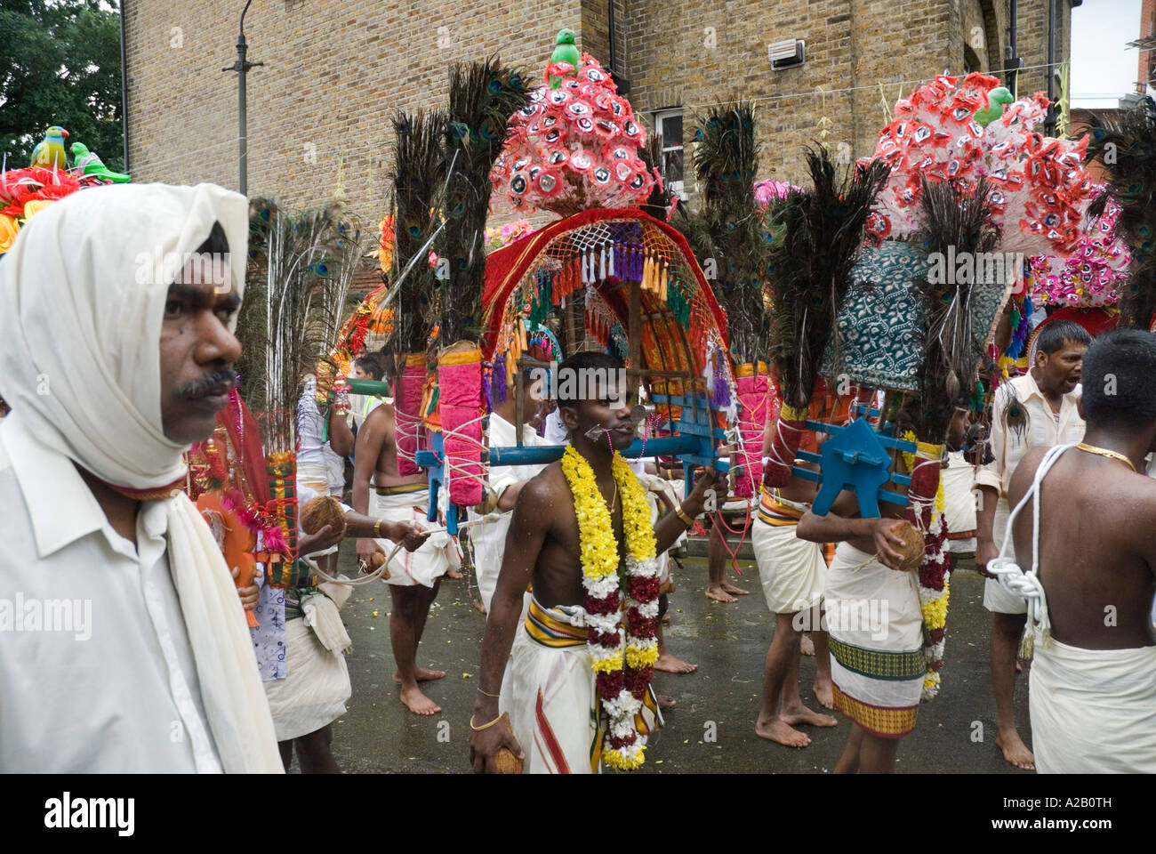 Sri Kanaga Thurkai Amman Temple Young men performing Kavadi the annual Chariot Festival West Ealing London Stock Photo