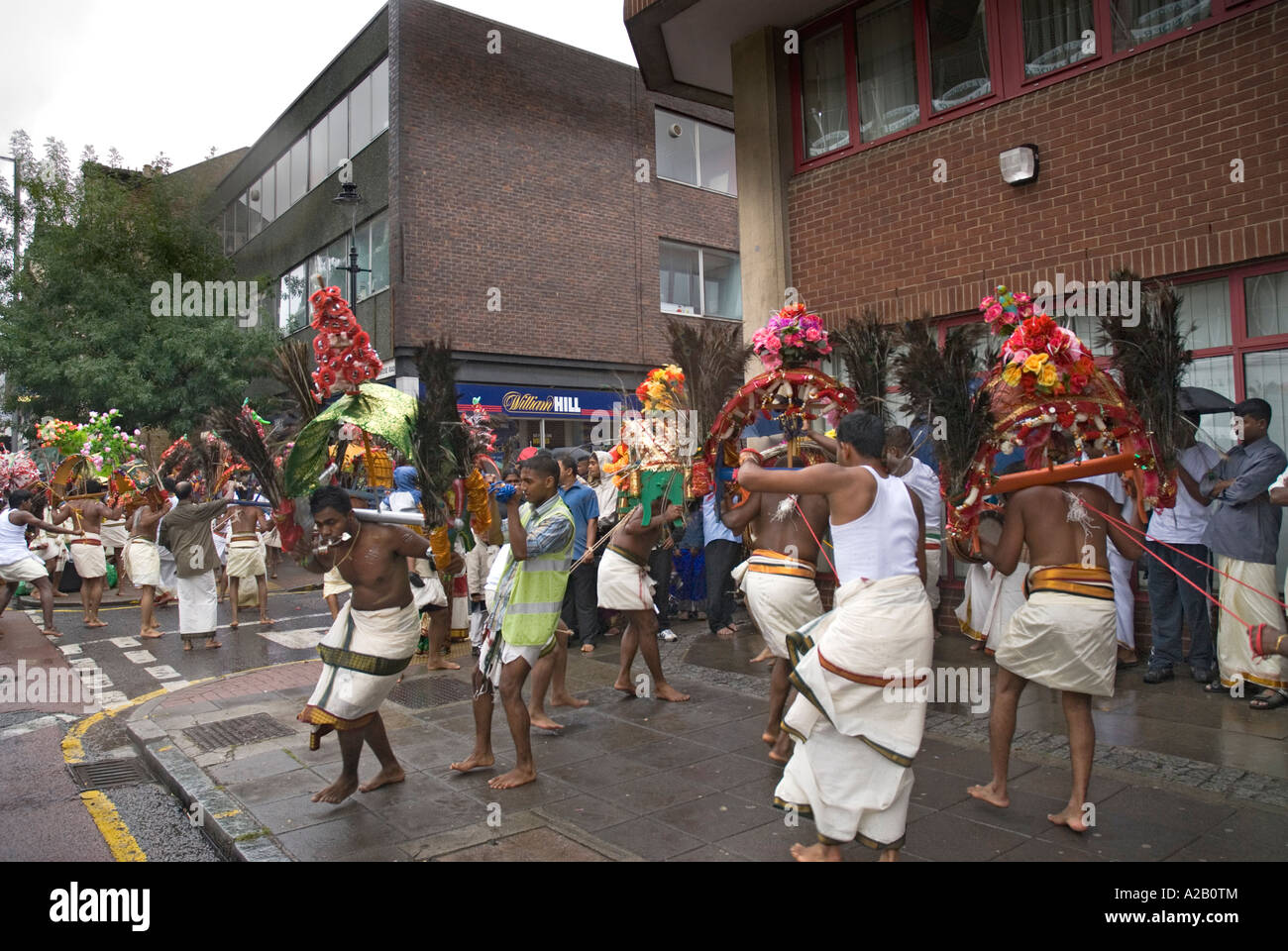 Young men from Sri Kanaga Thurkai Amman Temple performing Kavadi the annual Chariot Festival West Ealing London Stock Photo
